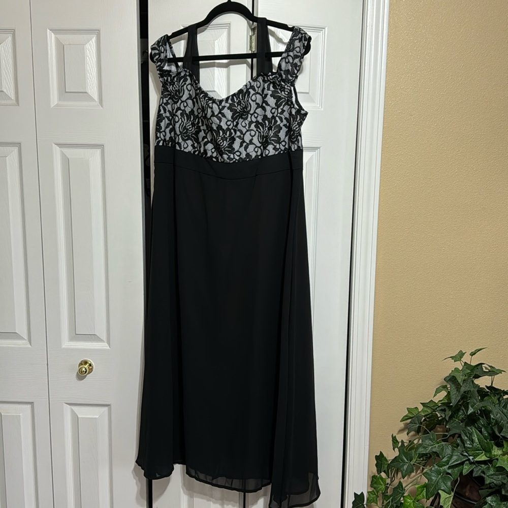 Size 3 XL open shoulder, formal dress black sheer with a floral appliqué top
